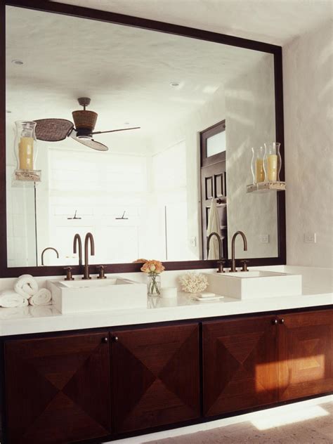 The most common double vanity mirror material is metal. Photo Page | HGTV