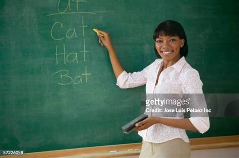 Teacher Erasing Chalkboard Photos And Premium High Res Pictures Getty Images