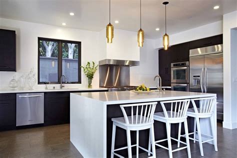 There is just something super cool and snazzy about a green bar stool. 2020 Latest Lights Over Breakfast Bar