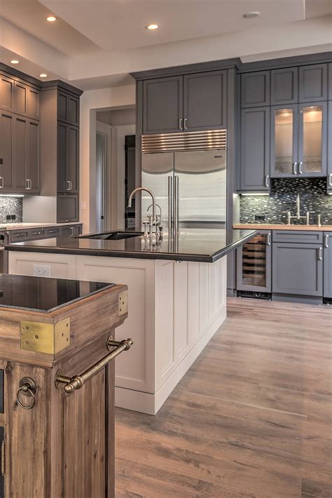 The whole space has a custom feel to it, complimented by the i absolutely love this modern yet classic feeling kitchen design with grey lower cabinets and white uppers. 34 Popular Modern Gray Kitchen Cabinets Ideas (Dark or Light)?