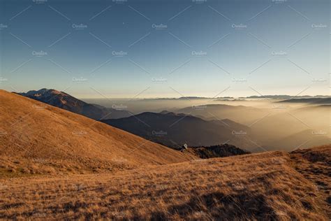 Sunset In The Grassy Hills In Autumn Stock Photo Containing Sunset And
