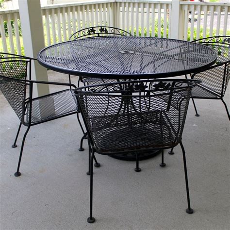 Wrought studio™ corinth wrought iron indoor/outdoor dining chair cushion fabric: Wrought Iron Patio Table, Four Chairs and Umbrella Stand ...