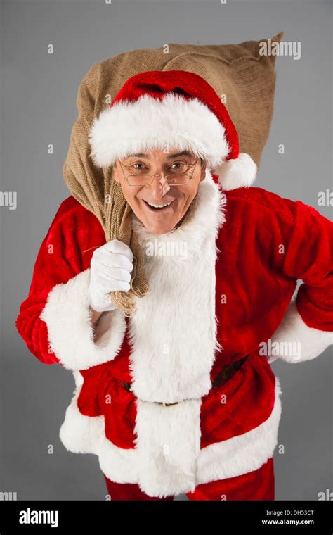 Santa Claus Holding A Sack Stock Photo Alamy