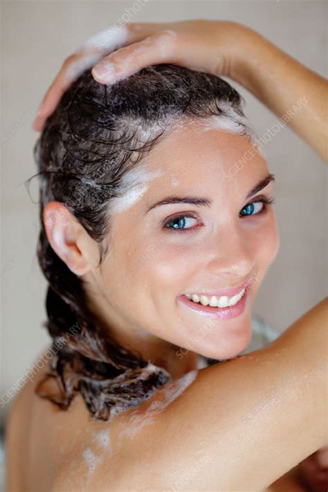 Woman Washing Her Hair Stock Image C Science Photo Library
