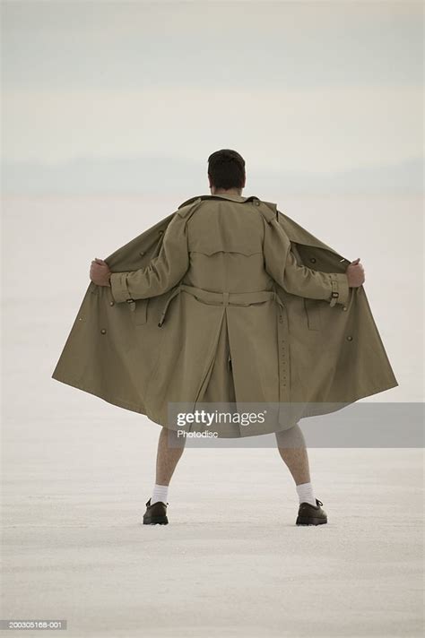 Exhibitionist Spreading Front Of Coat At Beach Photo Getty Images