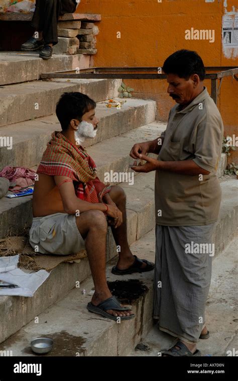 Man Being Shaved On The Ghats Varanasi India Stock Photo Alamy