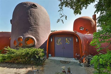 Orange And Purple Flintstones House Called An Eyesore By Locals Sells