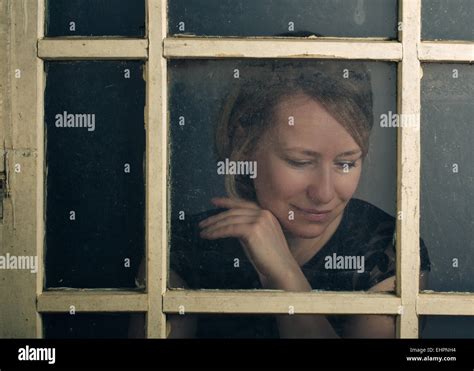 Woman Behind Window Stock Photo Alamy