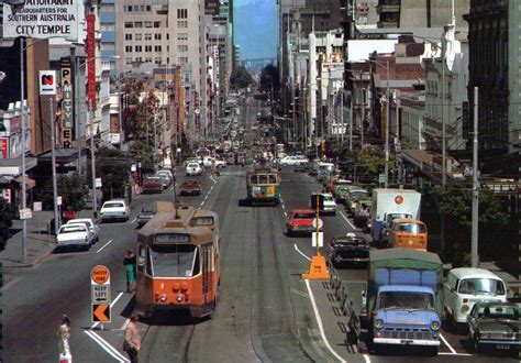 Incredible views overlooking melbourne city skyline. transpress nz: traffic in Bourke Street, Melbourne, 1970s
