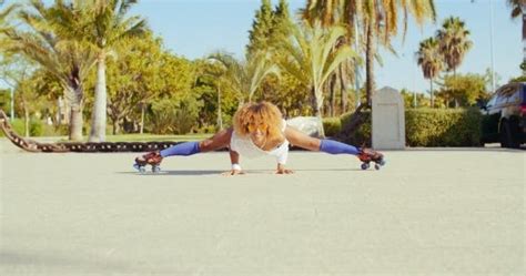 Sexy Flexible Girl Doing Splits On Roller Skates Stock Footage Videohive