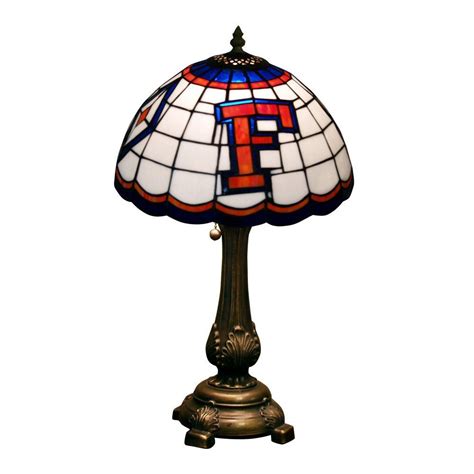 Named after the designer who created the sensation, louis comfort tiffany, the tiffany style lamp is now synonymous with a distinctly american tradition of quality. Amazon.com: NCAA Florida Gators Tiffany Table Lamp: Sports & Outdoors | Tiffany table lamps ...