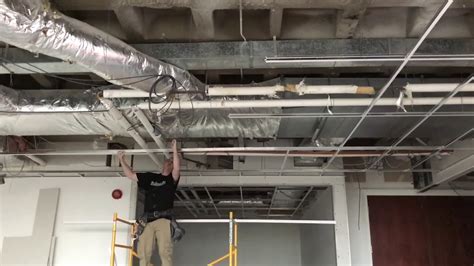 Find out about the benefits that a suspended ceiling has over a traditional ceiling. Installing T-Bar Drop Ceiling (Accelerated Time) - YouTube