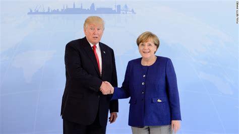 the merkel trump handshake heard round the world cnnpolitics