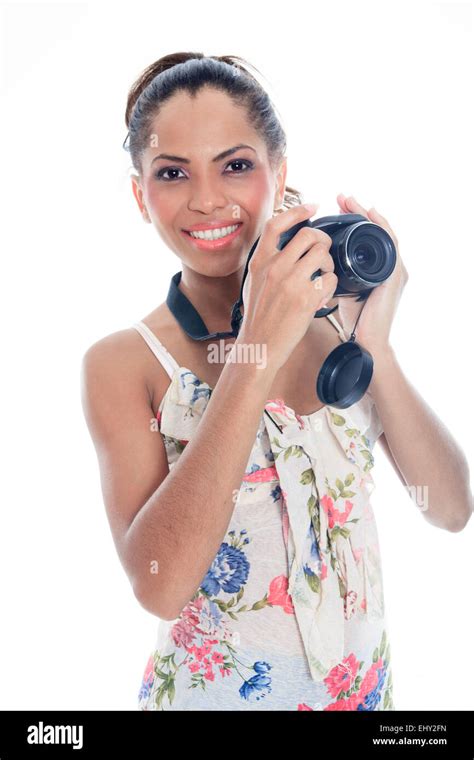 Girl Photographer Takes Snaps Isolated On White Stock Photo Alamy