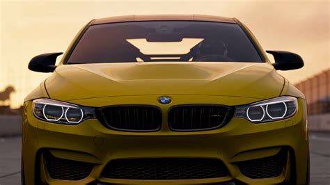 Download 1366x768 Bmw M3 Yellow Front View Luxury Cars