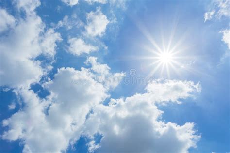 The Sun Shines Bright In The Daytime In Summer Blue Sky And Clouds