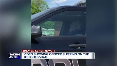 Police Officer Caught On Video Sleeping On Duty
