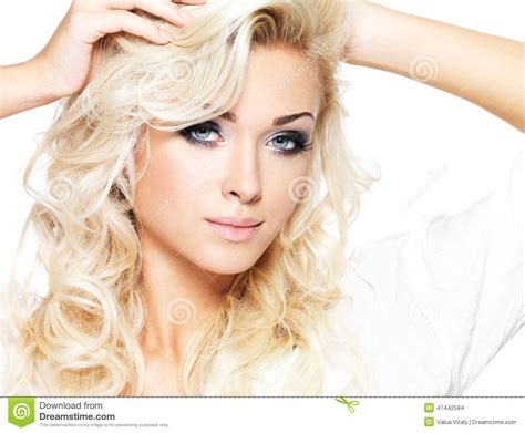 Beautiful Blond Woman With Long Curly Hair And Style Makeup Stock