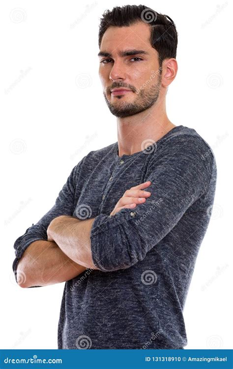 Studio Shot Of Young Handsome Man With Arms Crossed Stock Photo Image