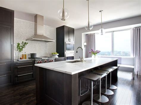 Keep your kitchen cabinets up to date with a modern makeover. THIS OR THAT: WHITE VS. WOOD IN TWO STYLISH KITCHENS ...