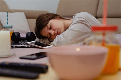 Student Girl With Books And Coffee Sleeping On The Table Stock Image
