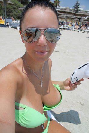 Colossal Cleavage On The Beach Porno Photo