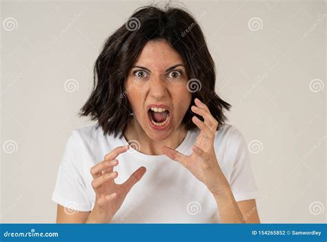 Portrait Of A Beautiful Young Woman With Angry Face Looking Furious