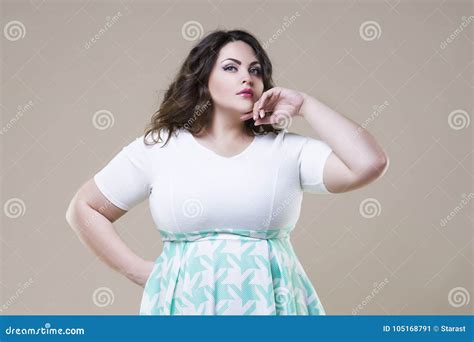 Plus Size Fashion Model Fat Woman On Beige Background Royalty Free