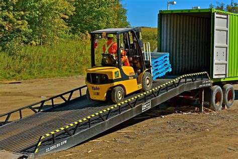 Forklift Truck And Steel Loading Ramps Portable Loading Dock