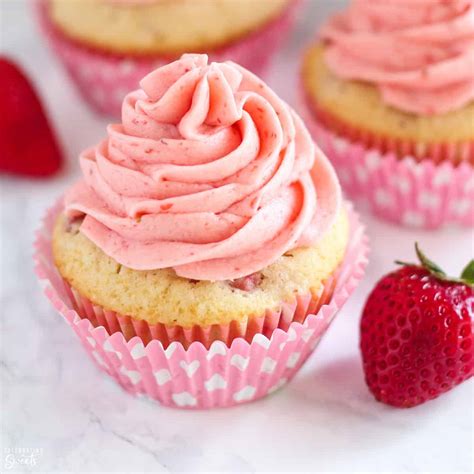 Vanilla Cupcakes With Strawberry Frosting
