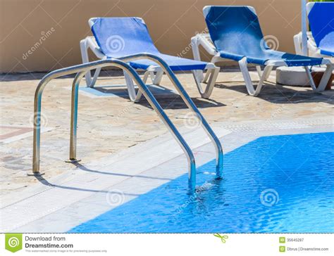 See more ideas about lounger, loungers chair, outdoor loungers. A Swimming Pool With Sun Loungers Stock Image - Image of ...