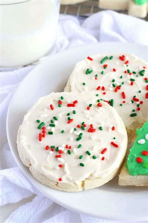 Form sugar cookie dough into balls, roll in regular sugar, place on a baking sheet, and make a shallow indentation in the center of each one with your thumb. Gluten Free Soft Frosted Sugar Cookies - What the Fork