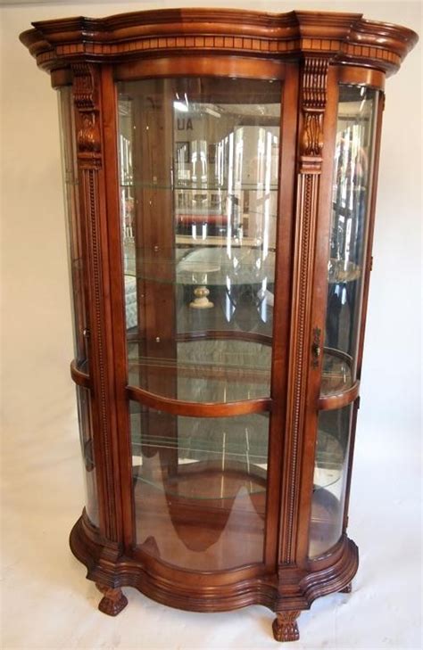 Hexagonal curio cabinet with top/base finished in whiteshelf support finished in chromeconstructed pulaski furniture cherry curved corner curio. 53: Cherrywood Curved Glass Curio Cabinet