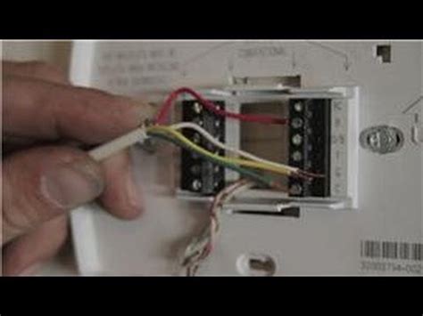 When working with a thermostat the cover can be snapped off to expose the wiring. Central Air Conditioning Information : How to Wire a Digital Thermostat - YouTube