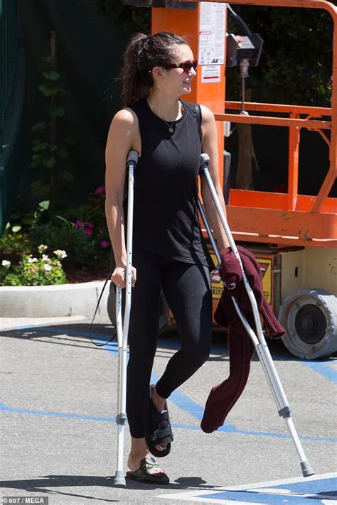 Nina Dobrev Leaves Pilates Class On A Pair Of Crutches Daily Mail Online