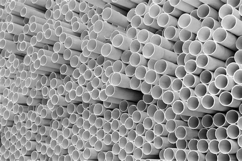 Premium Photo Pvc Pipes Stacked In Warehouse