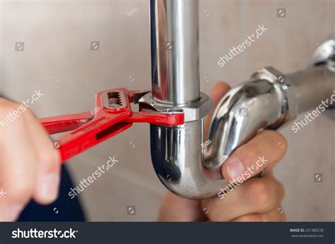 Closeup Plumber Fixing Pipe Wrench Stock Photo Edit Now 231389278