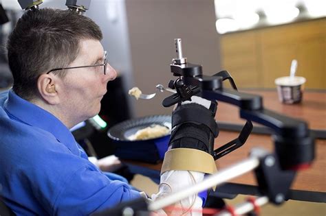 Paralyzed Man Feeds Himself Using His Thoughts Thanks To Brain Implant