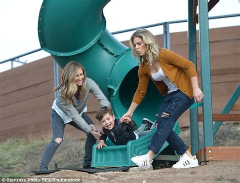 Jillian Michaels With Partner Heidi During A Playful Day At The Park