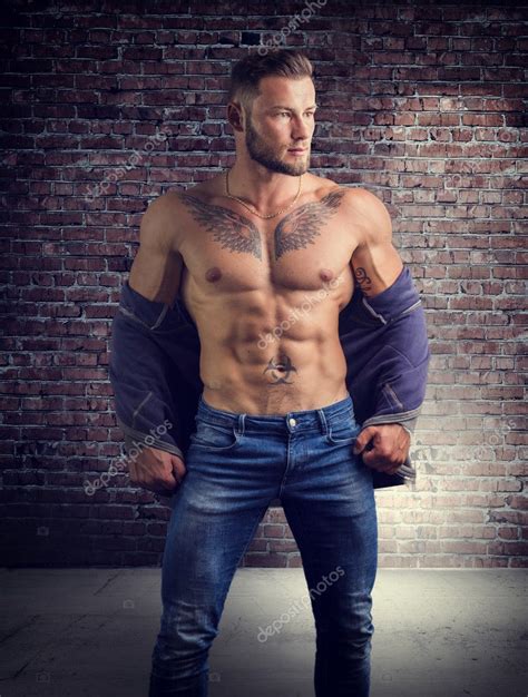Handsome Half Naked Muscular Man Standing Stock Photo By Artofphoto