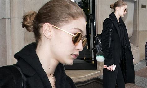 Downcast Gigi Hadid Has A Day Off Haute Couture In Paris Daily Mail