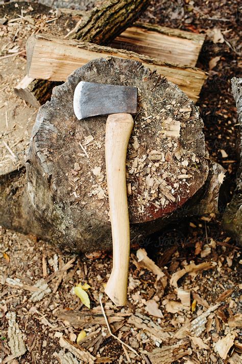 Axe Used For Firewood By Stocksy Contributor Brian Powell Stocksy