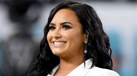 demi lovato goes makeup free to proudly display her freckles and booty chin