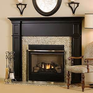 This cast stone electric fireplace features intense carvings and a black fossil stone top. Pin by Victoria Woodruff on Home - Fireplaces | Black ...