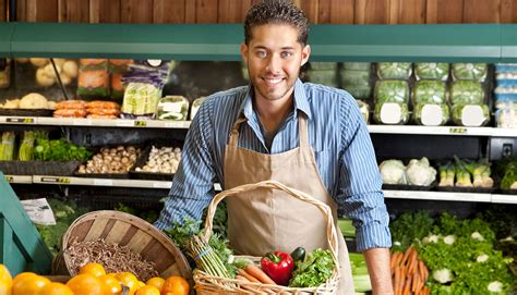 Grocery Store Clerk With Vegetables Eatsf