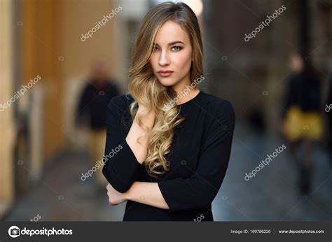 Beautiful Blonde Russian Woman In Urban Background Stock Photo By