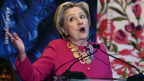 Photo Captures Hillary Clinton Reading About Pences Emails