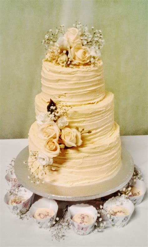 Tier Wedding Cake With Butter Cream Covering Dressed With Fresh