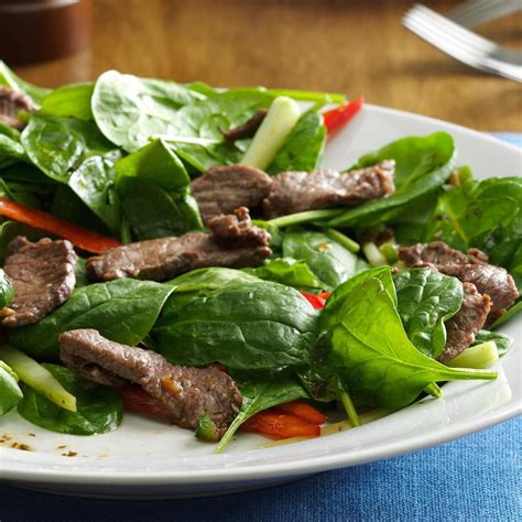 We're all about sharp mustard vinaigrette paired with creamy feta and toasted almonds, but you can swap in your favorite cheese and nuts if you like! Thai Spinach Beef Salad Recipe | Taste of Home