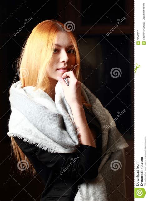 Fine Blonde With Long Hair Dreamy Looking At The Camera Hand Up Stock